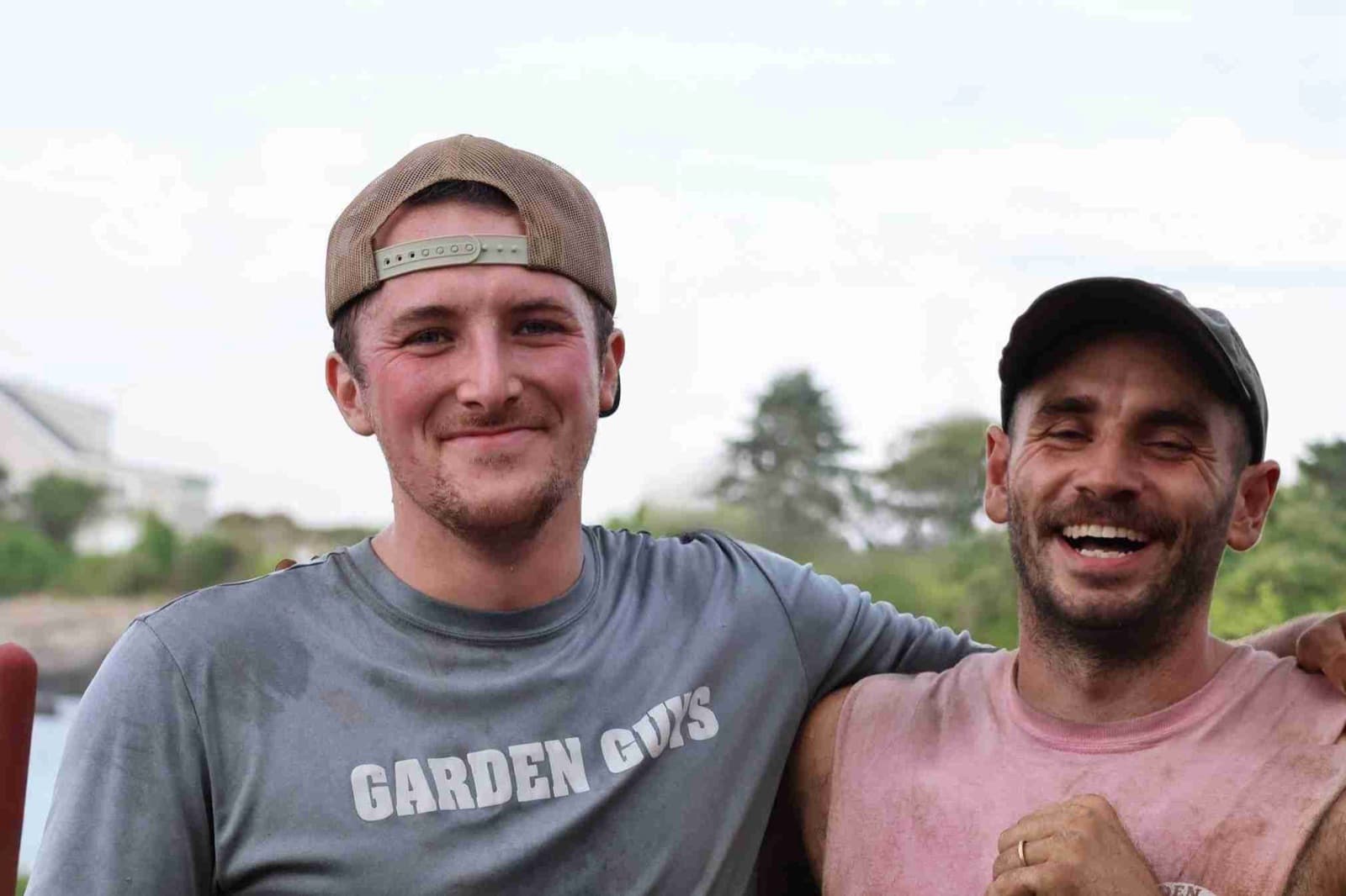 Two Garden Guys crew members on site in Southern Maine