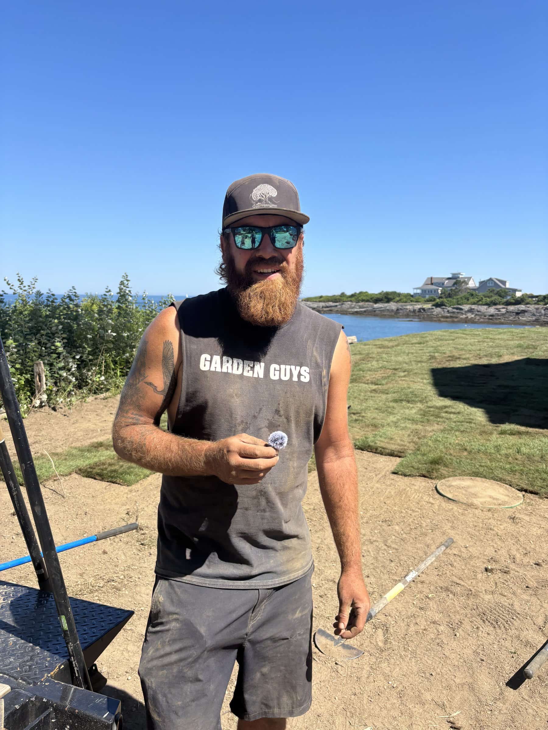 Garden Guys crew member at an oceanfront install